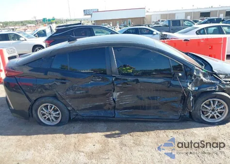 2021 Toyota Prius Prime Limited z USA, uszkodzony, nr VIN JTDKAMFP5M3195132